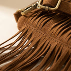 Close-up of fringe stitching and texture on Brown camel fringe crossbody bag