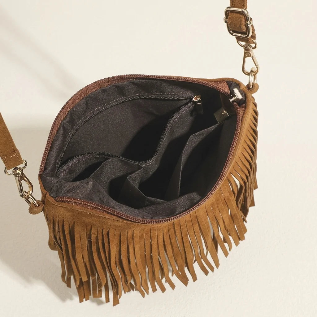 Interior lining and pockets of Brown camel fringe crossbody bag