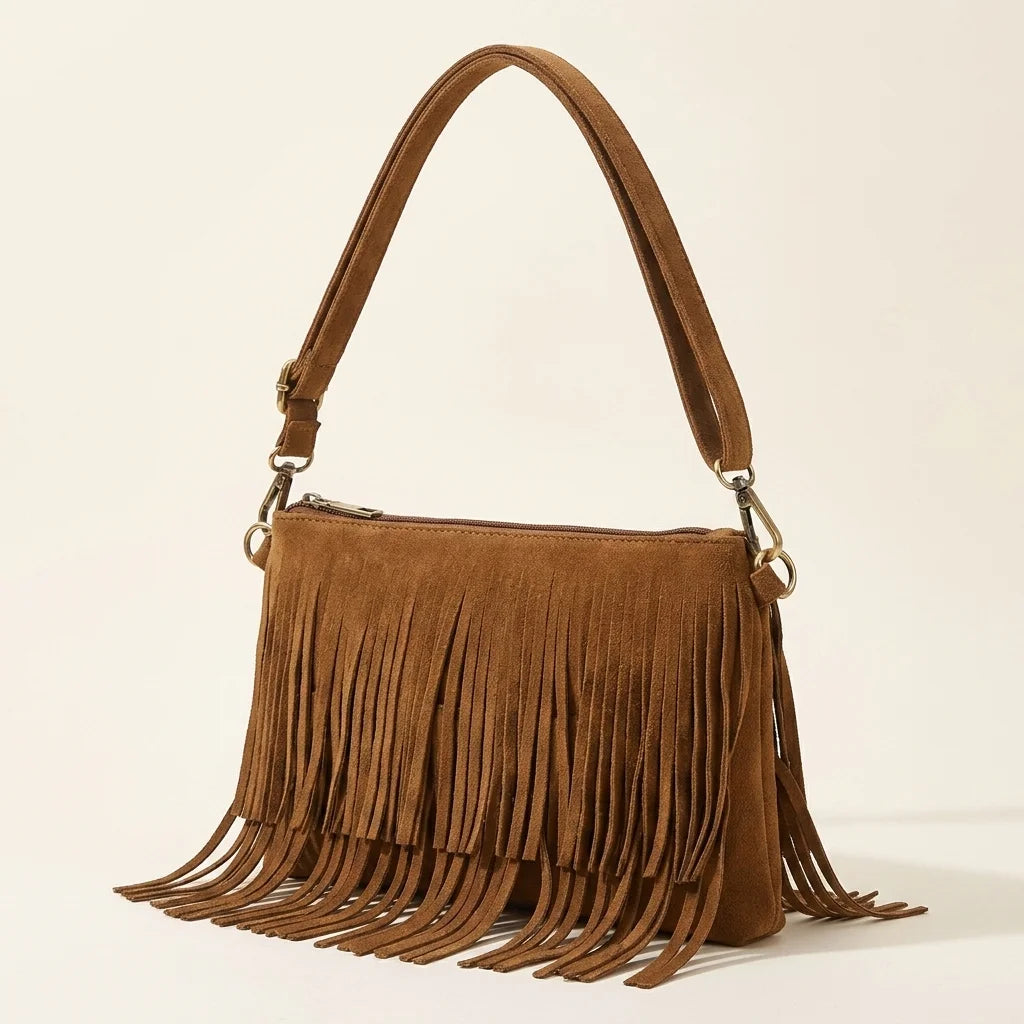 Brown camel fringe crossbody bag, three-quarter angle showing side depth
