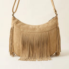 Back panel of Apricot camel fringe hobo bag with strap attachments