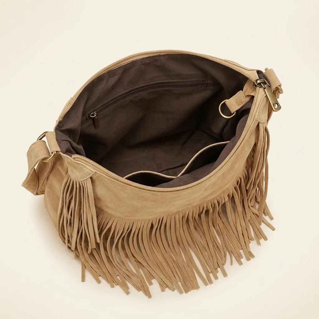 Interior lining and pockets of Apricot camel fringe hobo bag