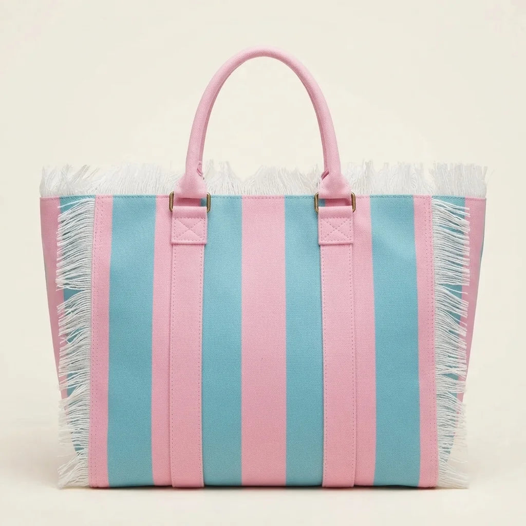 Back panel of Pink & Blue canvas fringe tote bag with strap attachments