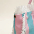 Close-up of fringe stitching and texture on Pink & Blue canvas fringe tote bag