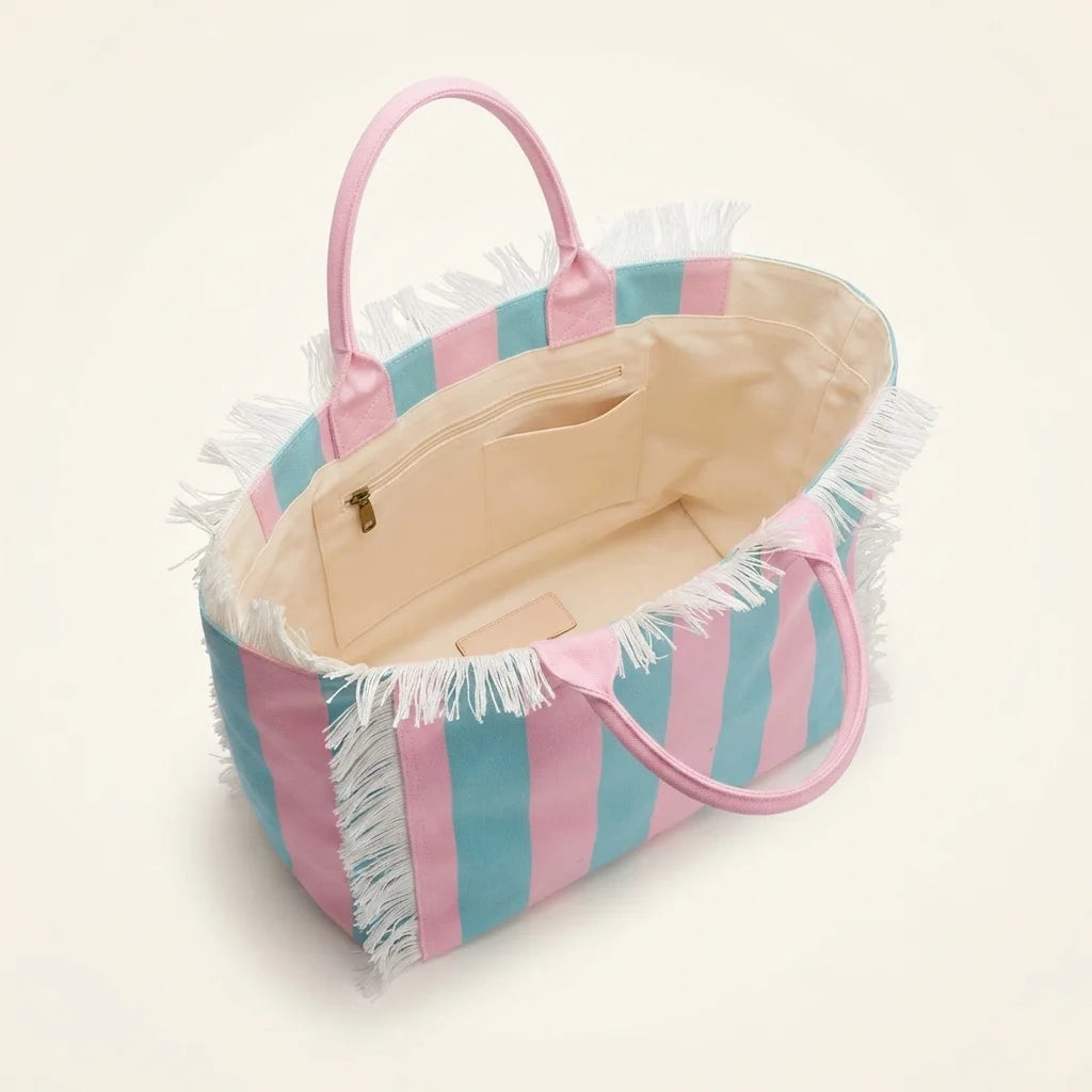 Interior lining and pockets of Pink & Blue canvas fringe tote bag
