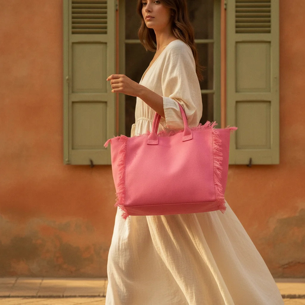 Woman wearing Pink canvas fringe tote bag with swaying fringe
