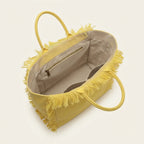 Interior lining and pockets of Yellow canvas fringe tote bag