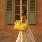 Woman wearing Yellow canvas fringe tote bag with swaying fringe
