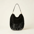 Black cowhide bag with fringe, front view