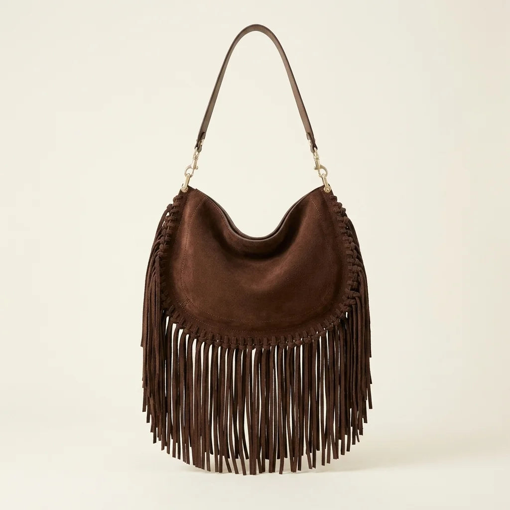 Coffee cowhide bag with fringe, front view