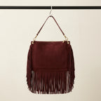 Back panel of Red cowhide bag with fringe with strap attachments