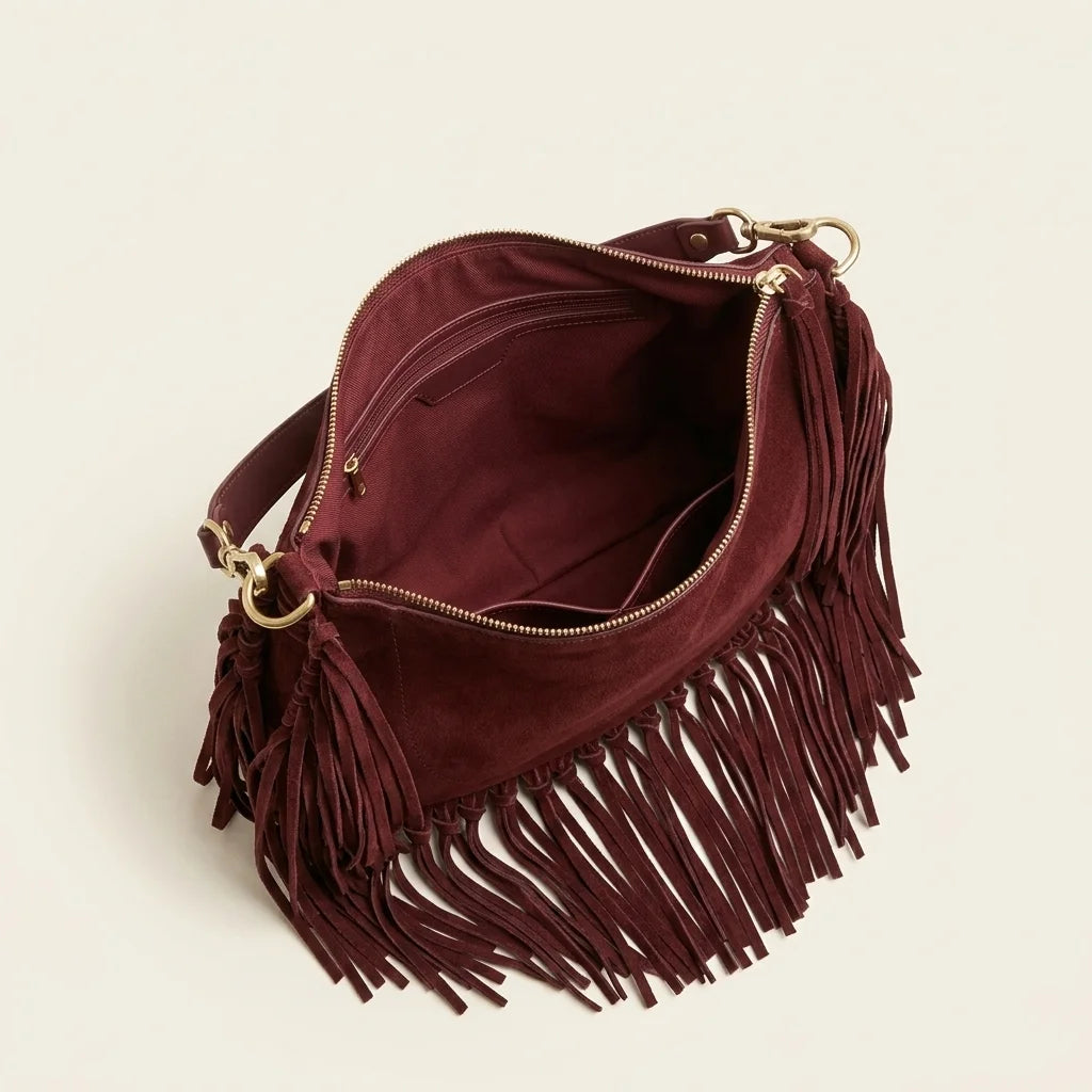 Interior lining and pockets of Red cowhide bag with fringe