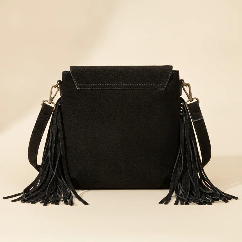 Back panel of Black cowhide crossbody bag with fringe with strap attachments