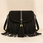 Black cowhide crossbody bag with fringe, front view