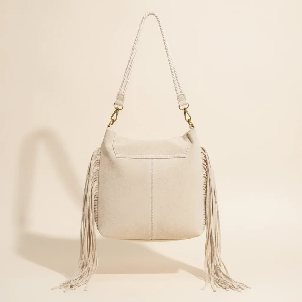 Back panel of Cream cream fringe bag with strap attachments