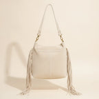 Back panel of Cream cream fringe bag with strap attachments