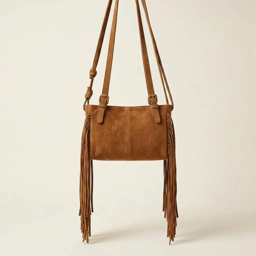 Back panel of Brown dark brown fringe bag with strap attachments
