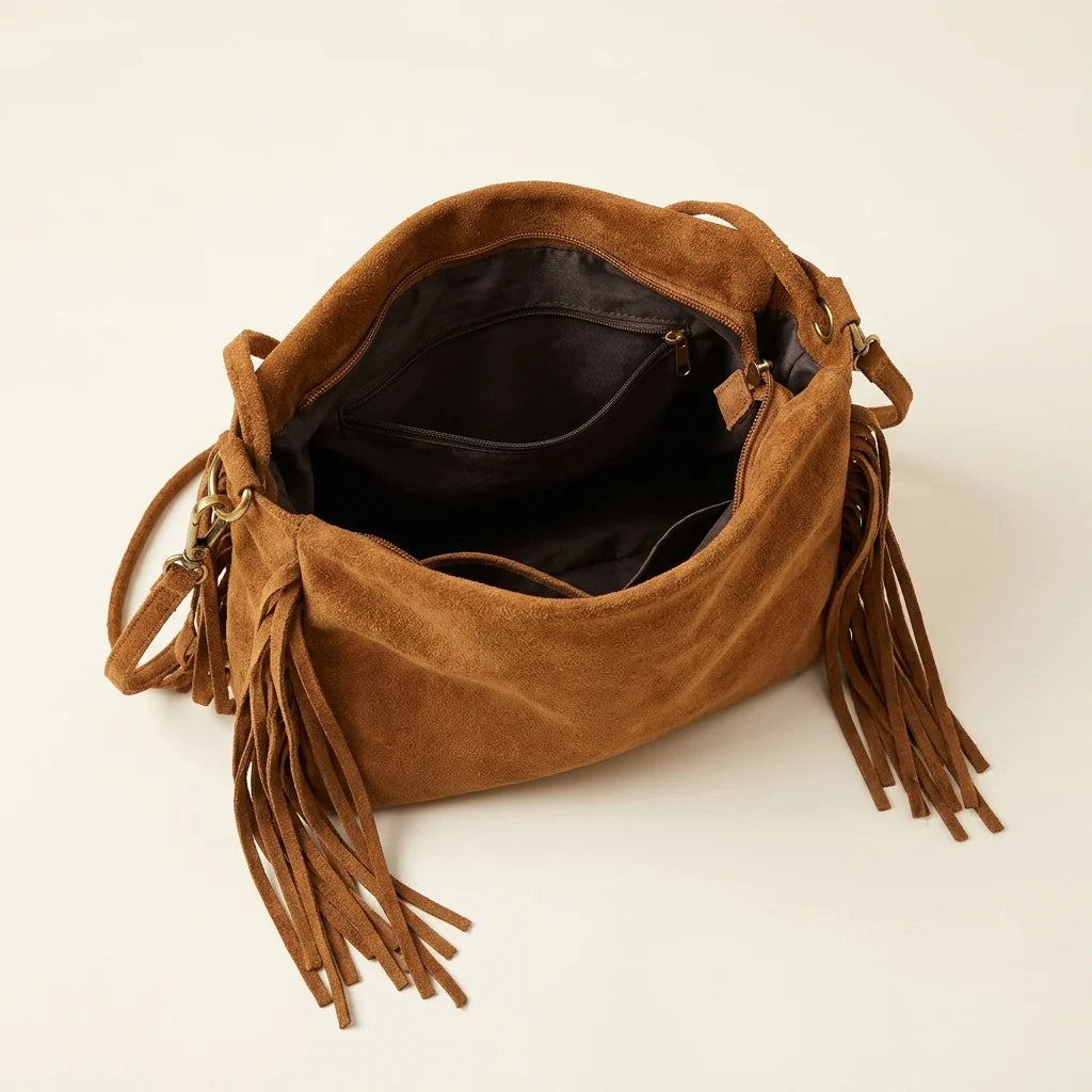 Interior lining and pockets of Brown dark brown fringe bag