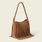 Camel suede fringe crossbody bag, three-quarter angle showing side depth