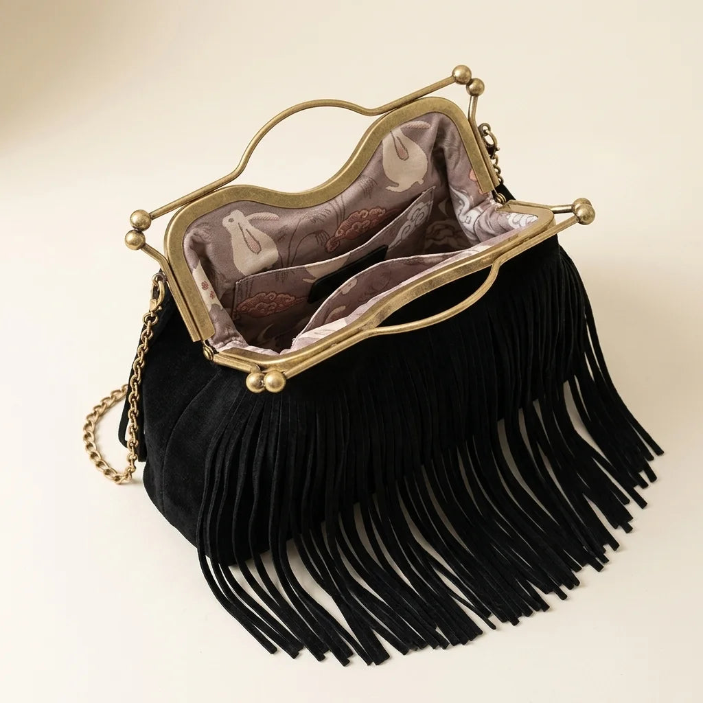 Interior lining and pockets of Black designer black fringe bag