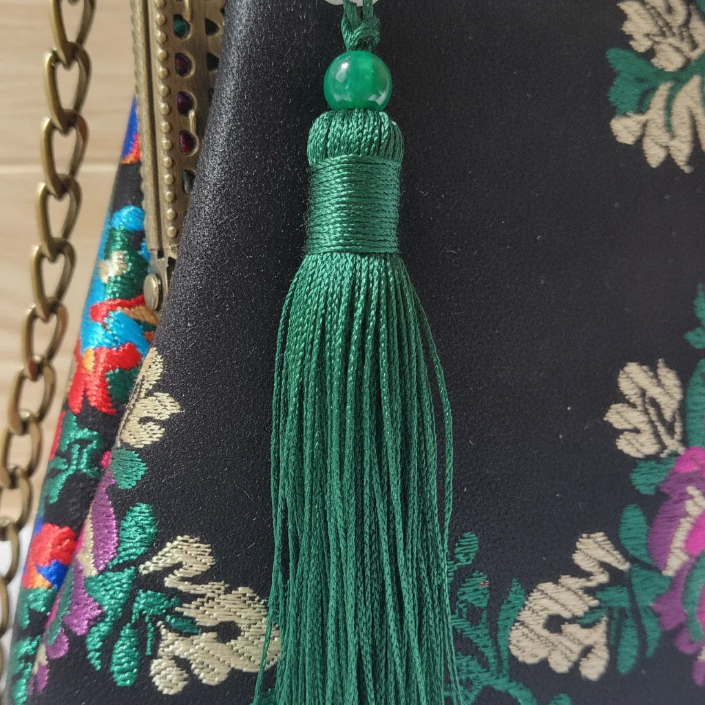 Close-up of fringe stitching and texture on Floral designer boho fringe bag