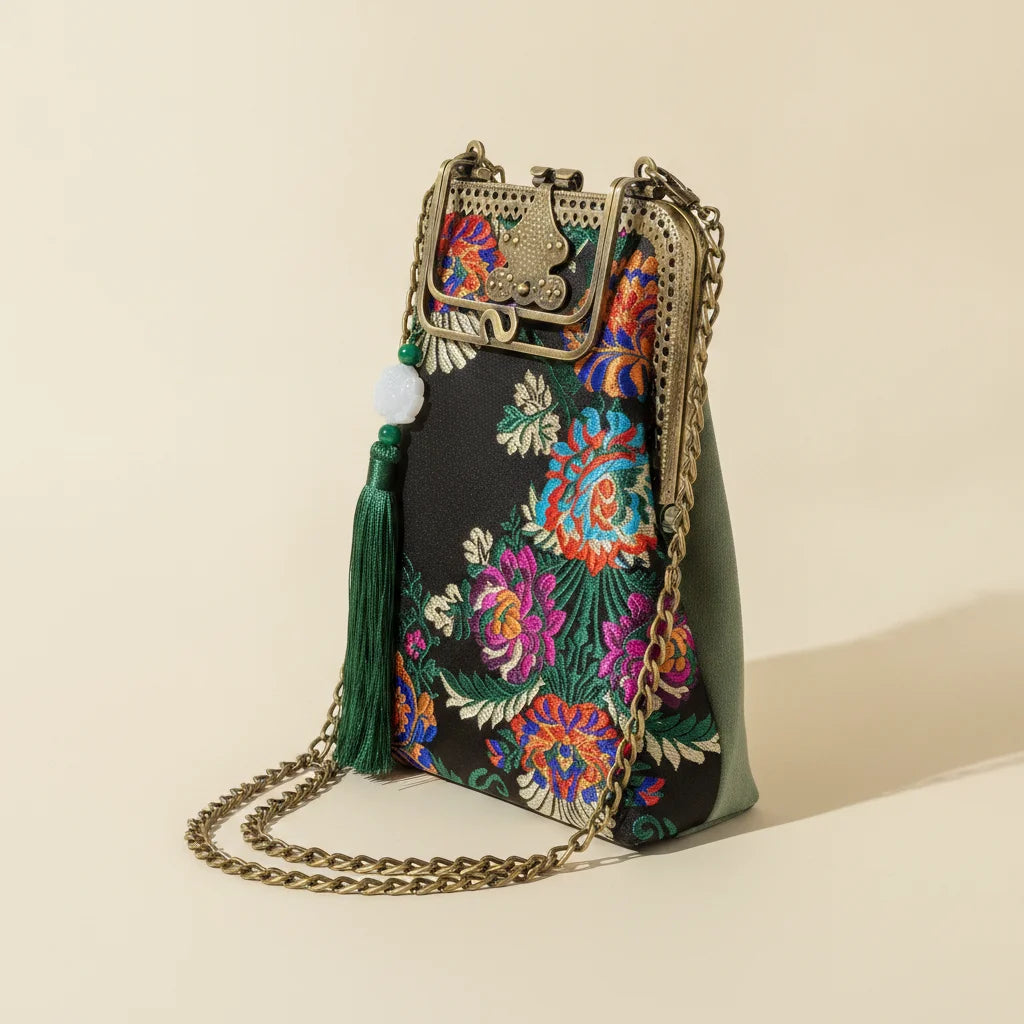 Floral designer boho fringe bag, three-quarter angle showing side depth