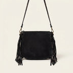 Back panel of Black designer fringe crossbody bag with strap attachments