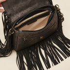 Interior lining and pockets of Black designer fringe crossbody bag