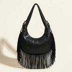 Back panel of Black faux leather fringe hobo bag with strap attachments