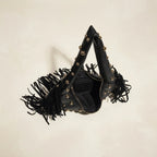 Interior lining and pockets of Black faux leather fringe hobo bag