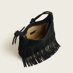 Interior lining and pockets of Black faux suede fringe bag