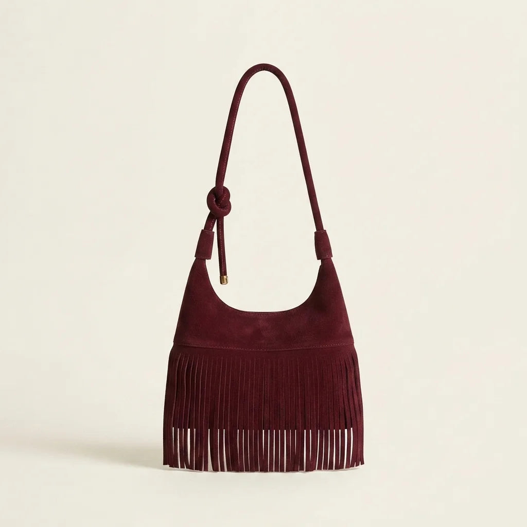 Burgundy faux suede fringe bag, front view