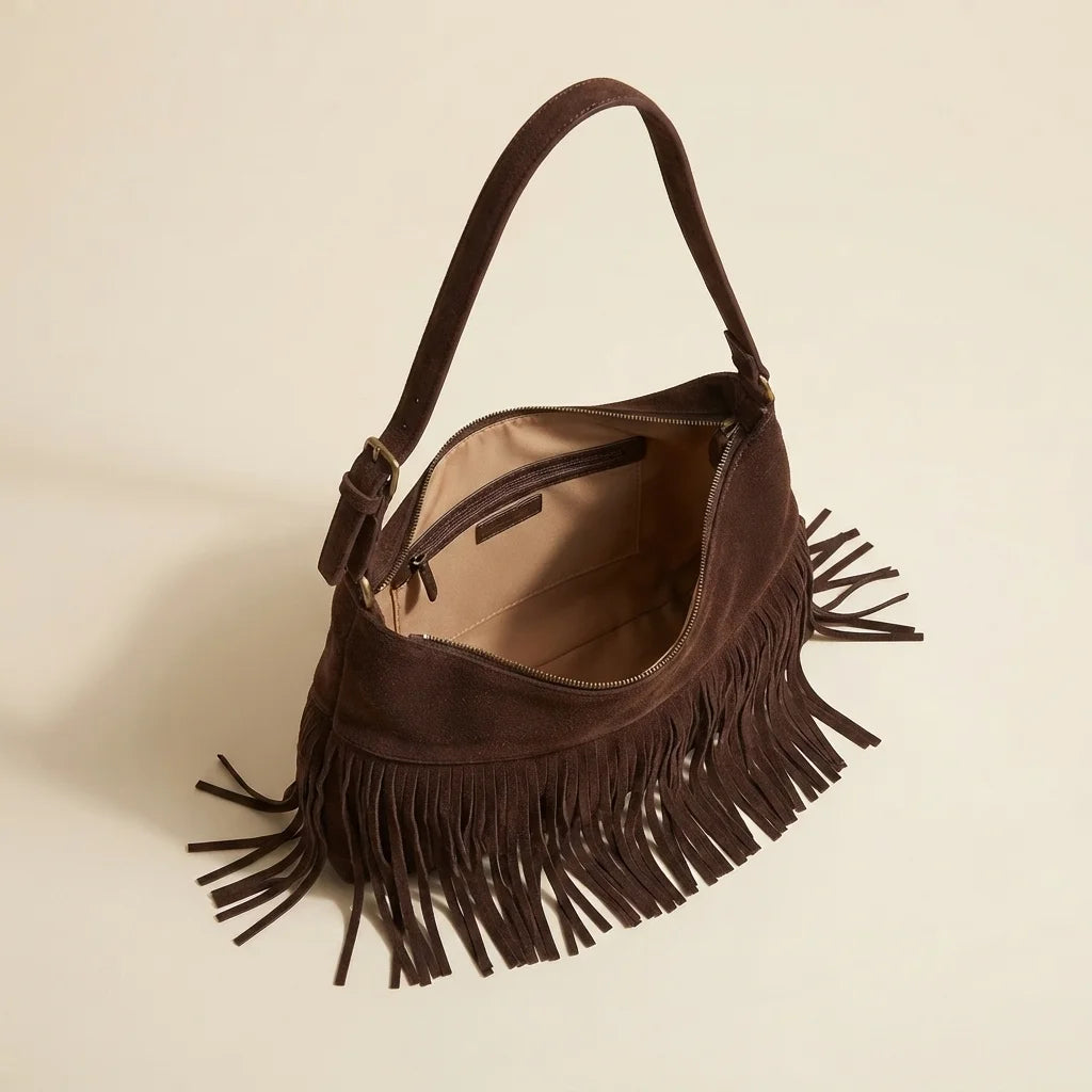 Interior lining and pockets of Coffee faux suede fringe bag