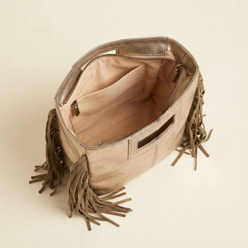 Interior lining and pockets of Champagne fringe backpack shoulder bag