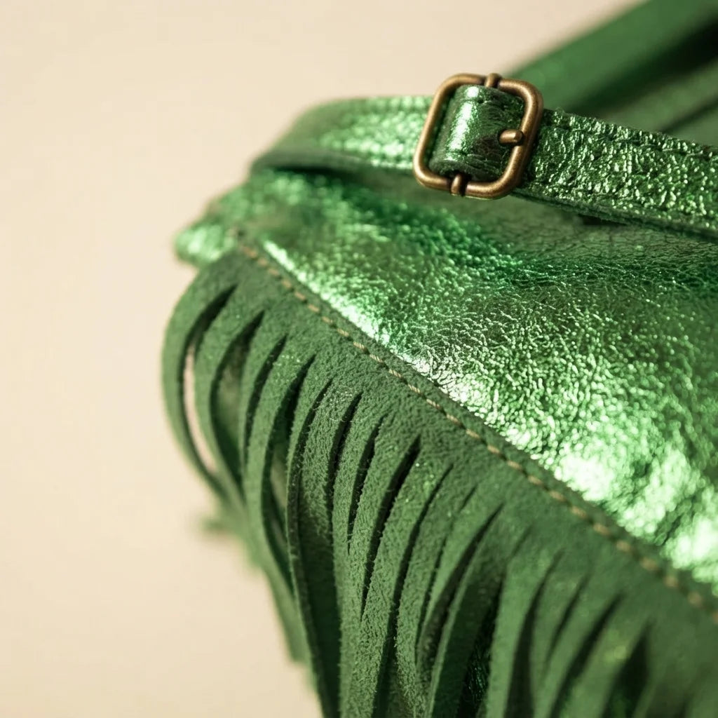 Close-up of fringe stitching and texture on Green fringe backpack shoulder bag
