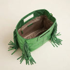 Interior lining and pockets of Green fringe backpack shoulder bag