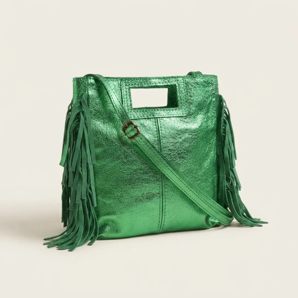 Green fringe backpack shoulder bag, three-quarter angle showing side depth