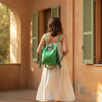 Woman wearing Green fringe backpack shoulder bag with swaying fringe