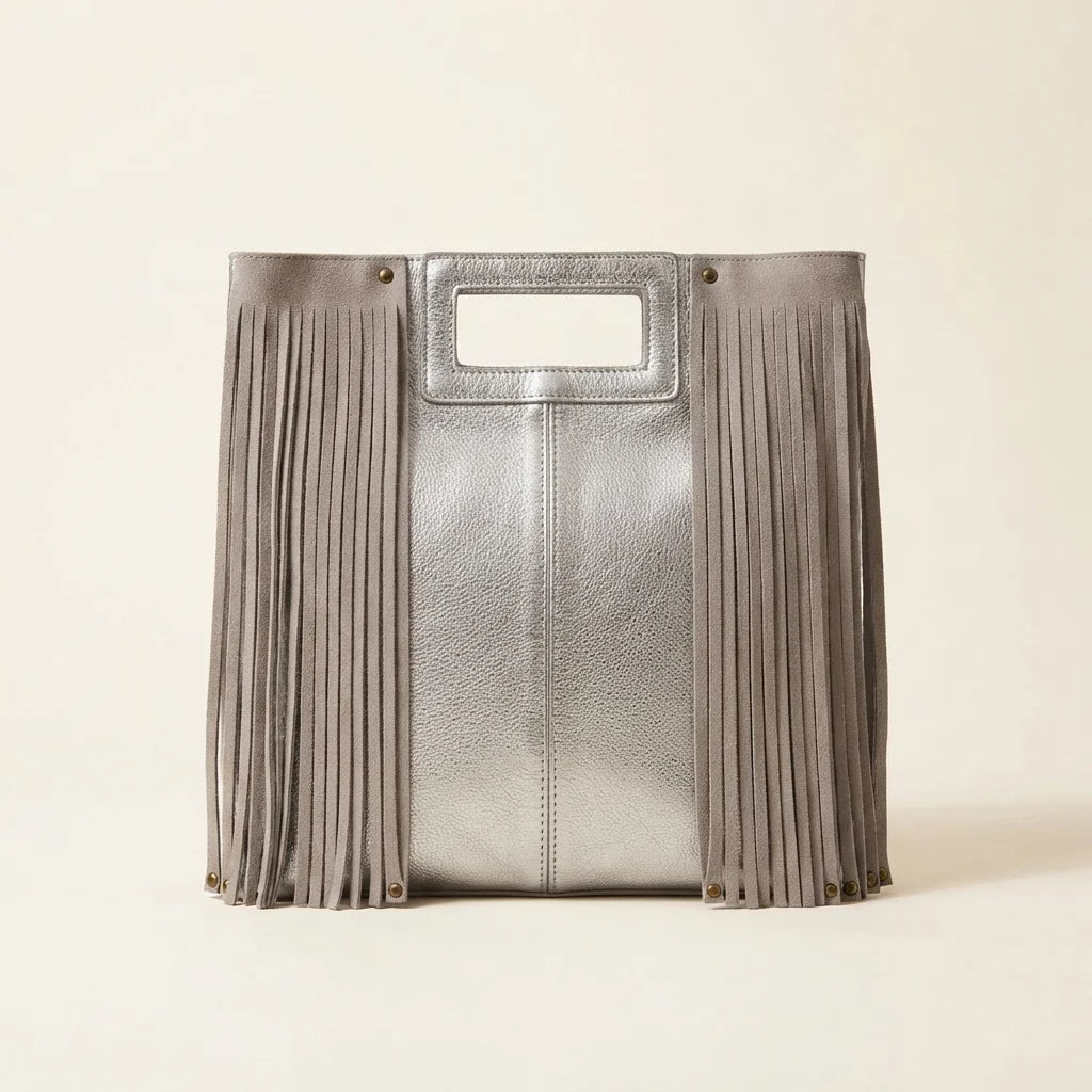 Silver fringe backpack shoulder bag, front view