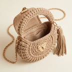 Interior lining and pockets of Beige fringe bucket bag crossbody
