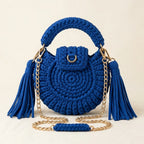 Back panel of Blue fringe bucket bag crossbody with strap attachments