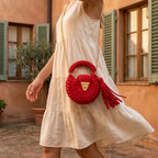Woman wearing Red fringe bucket bag crossbody with swaying fringe