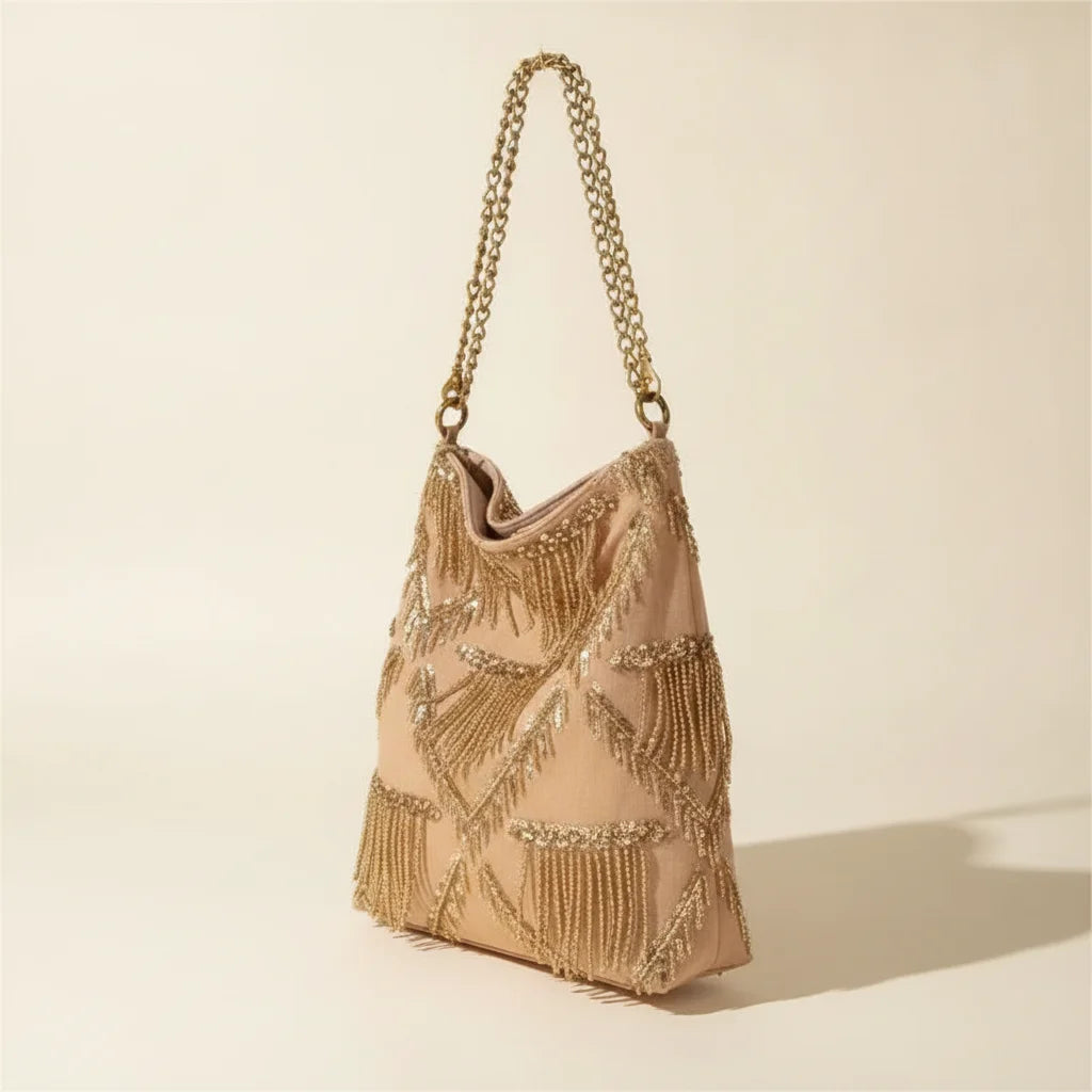 Light Brown fringe chain bag, three-quarter angle showing side depth