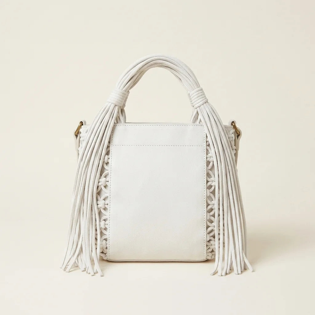 Back panel of White fringe clutch bag designer with strap attachments