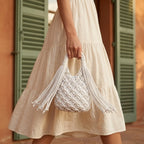 Woman wearing White fringe clutch bag designer with swaying fringe