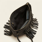Interior lining and pockets of Black fringe clutch bag leather