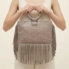 Back panel of Grey fringe clutch bag leather with strap attachments