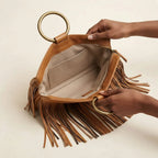 Interior lining and pockets of Khaki fringe clutch bag leather