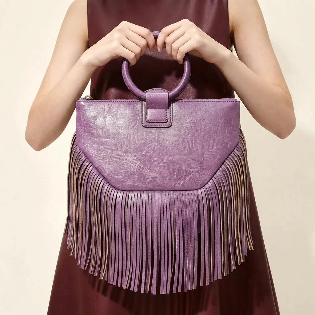 Purple fringe clutch bag leather, front view