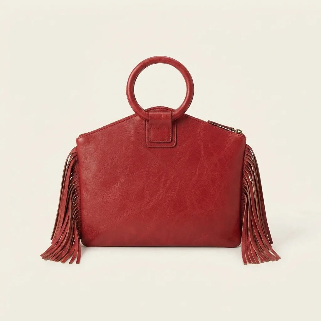 Back panel of Red fringe clutch bag leather with strap attachments