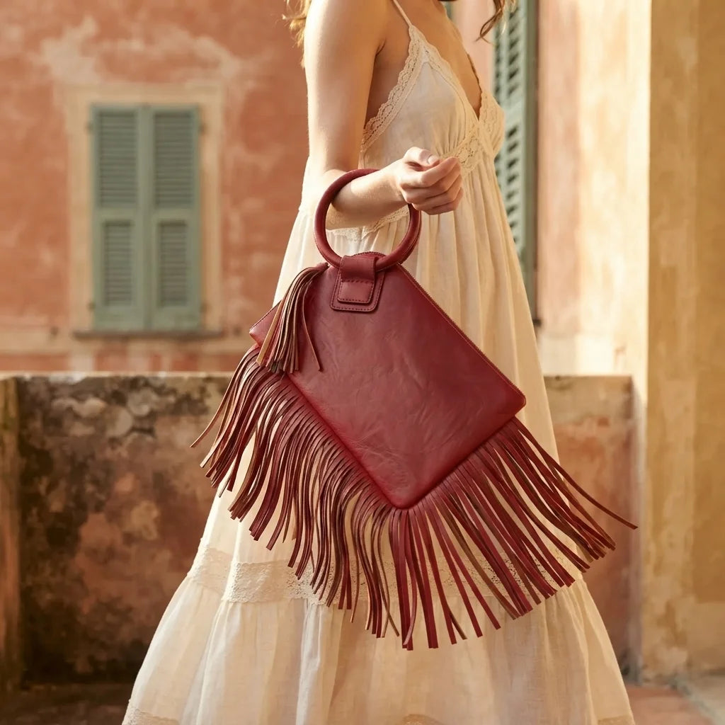 Woman wearing Red fringe clutch bag leather with swaying fringe